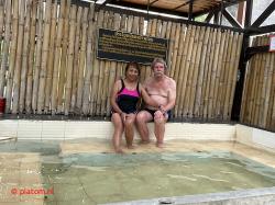 Bathing at hot springs.